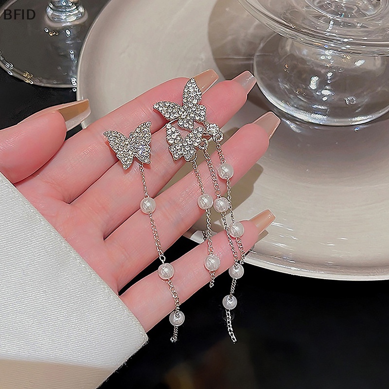 [BFID] 1pasang Anting Rumbai Mutiara Kupu-Kupu Warna Silver Temperamen Zirkon Asimetris Pendant Earring Untuk Wanita Perhiasan Gaya Korea [ID]