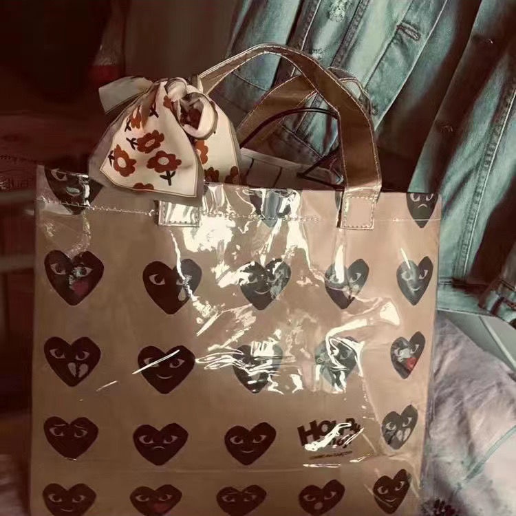 Sera trendy all-match one-shoulder heart handbag PVC transparan tas belanja kertas kraft berkapasitas besar siswa tote bag