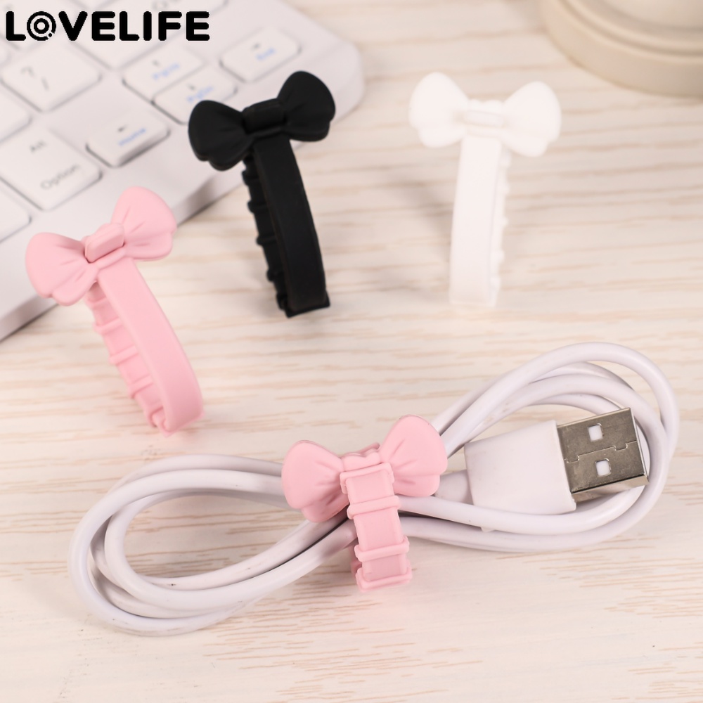 [Unggulan] Earphone Data Line Storaging Holder Anti Lilitan Kabel Ties Indah Wire Cord Organizer Multifungsi Snap On Type Wire Fixed Tie Bowknot Silicone Cable Winder