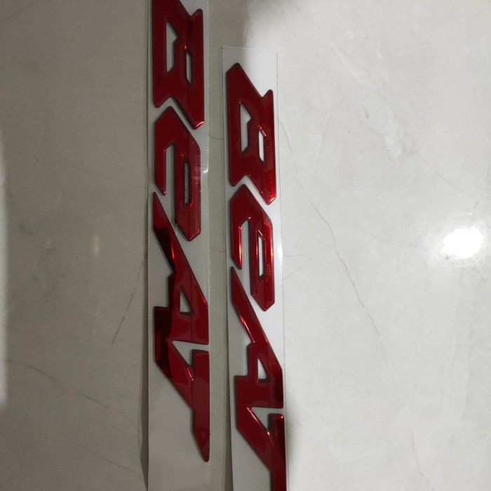 Emblem Beat Deluxe Merah