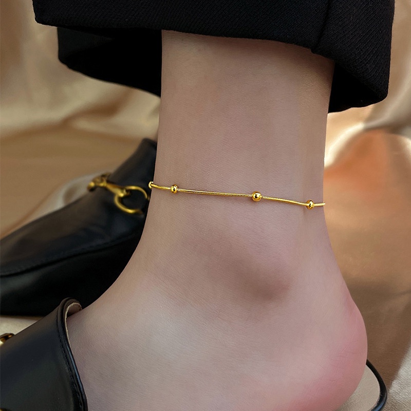 Gelang Kaki Emas Baja Titanium Perempuan Rasa Tinggi Gelang Kaki Cahaya Mewah Temperamen Fashion Rantai Engkel