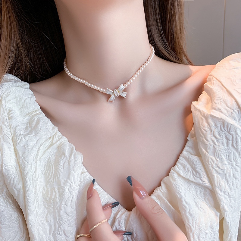 Ay (CN) Kalung Rantai Manik Mutiara Choker Liontin Busur Putih Elegan Untuk Aksesoris Perhiasan Wanita