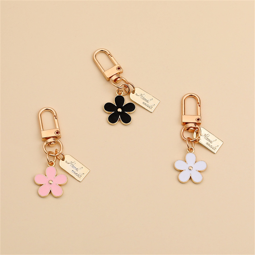 Enamel Manis Bunga Gantungan Kunci Fashion Tag Logam Gantungan Kunci Earphone Case Liontin Pesona Tas Ornamen Aksesoris Mobil Keyholder