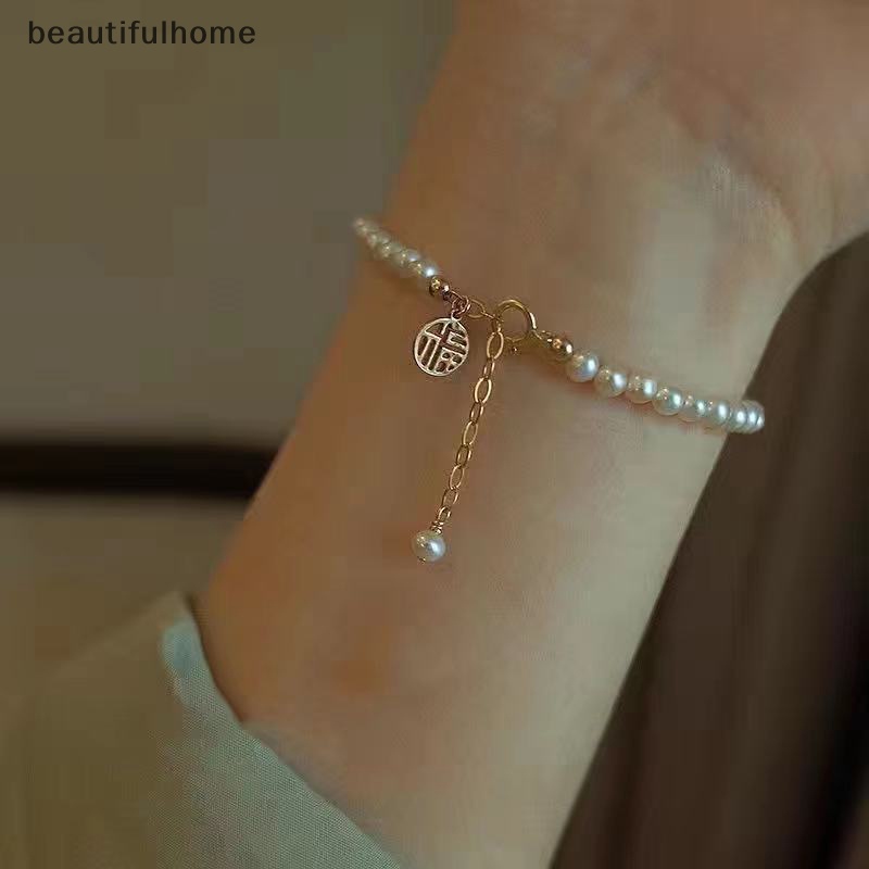 {beautifulhome} Mutiara Imitasi Berongga Tembaga Uang Gelang Yang Dapat Disesuaikan Untuk Elegan Berongga Berkah Beruntung Rumbai Panjang Wanita Pesona Mutiara Gelang Perhiasan Gadis Putri Ulang Tahun Gif