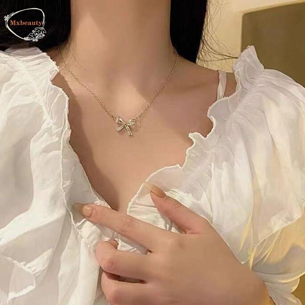 Mxbeauty Wanita Kalung Elegan Pesona Halus Klavikula Rantai Busur Tergantung Niche Desain Sweater Rantai Berlian Imitasi Gadis Choker