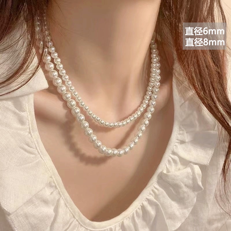 Kalung Mutiara Pearl Knotted Pearl Sweater Rantai Gaya Hepburn Manik-Manik Kalung Rantai Mutiara Panjang Cahaya Perhiasan Pakaian Mewah Selebriti Prancis Berkelas