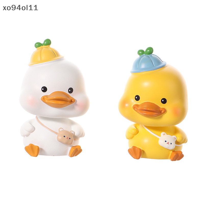 Xo Ornamen Mobil Lucu Resin Busur Bando Bebek Goyang Kepalanya Boneka Mobil Dekorasi OL