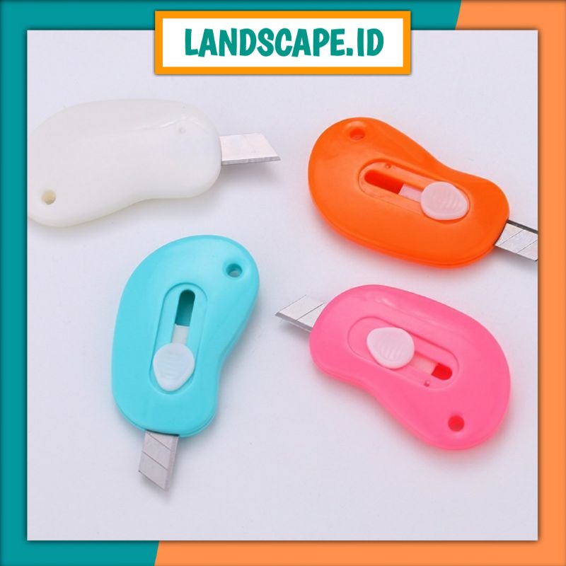 

LS Cutter Mini Portable Bentuk Oval Mini Cutter Polos Travel Kit Pemotong Kertas Paper Cutter Lucu