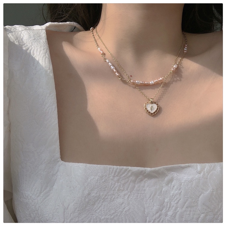 Influencer Manis Retro Gaya Baru Double-Layer Kalung Mutiara Rantai Klavikula Cahaya Mewah Niche Liontin Tren