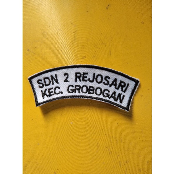 

Bordir bordir lokasi sekolah/Atribut lokasibisa pesan satuan