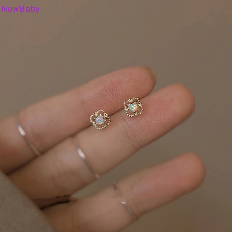 Ewbaby dessylower stud earrings perempuan mini minimalis niche desain berongga batu bulan anting bunga kecil earrings dalika