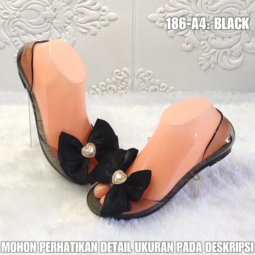 Sepatu Kaca Perempuan 186 A4 Sepatu Wanita Model Terbaru Motif Pita Transparan SPTFW