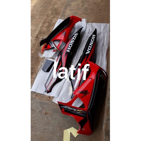 body supra x 125 lama merah ferarry