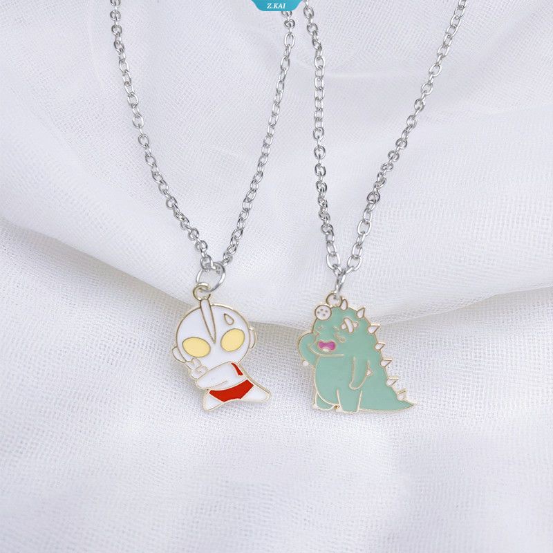 Anime Jepang Ultraman Dinosaurus Monster Kecil Kalung Mainan Kreatif Pasangan Siswa Cowok Hadiah Aksesoris [ZK]