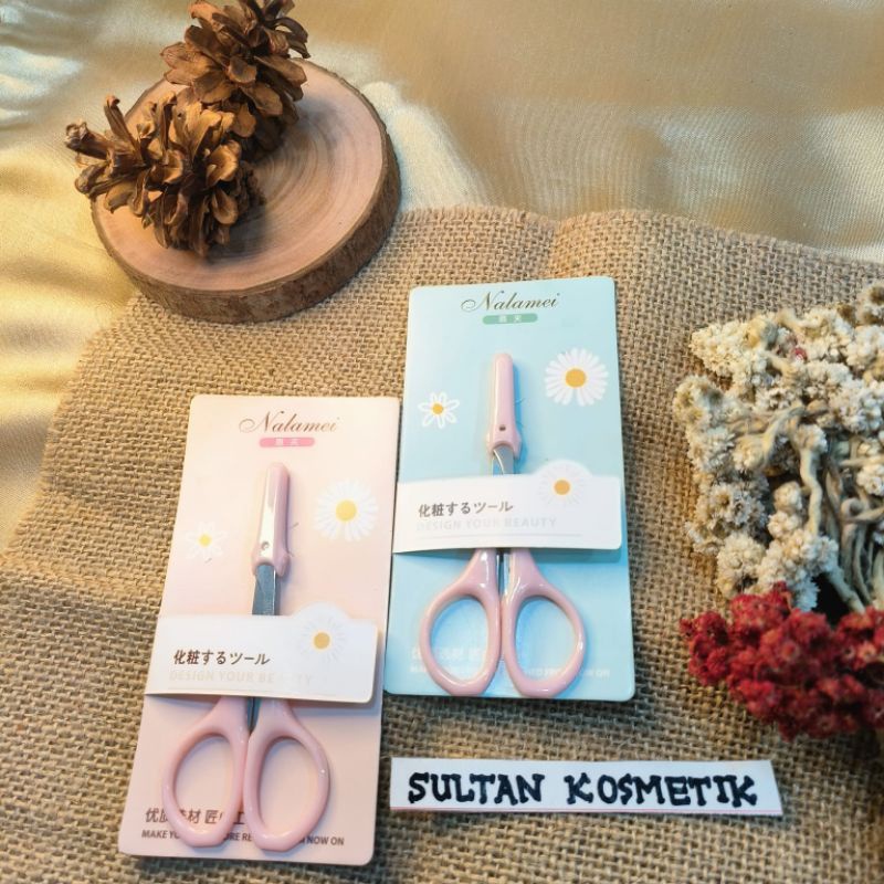 

Gunting kecil serba guna nalamei