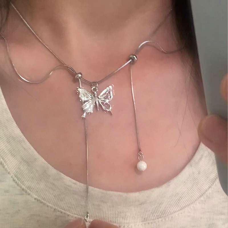 Niche Desain Logam Kalung Temperamen Serbaguna Kupu-Kupu Tetes Air Perak Pribadi Rumbai Manis Kalung Pribadi Wanita