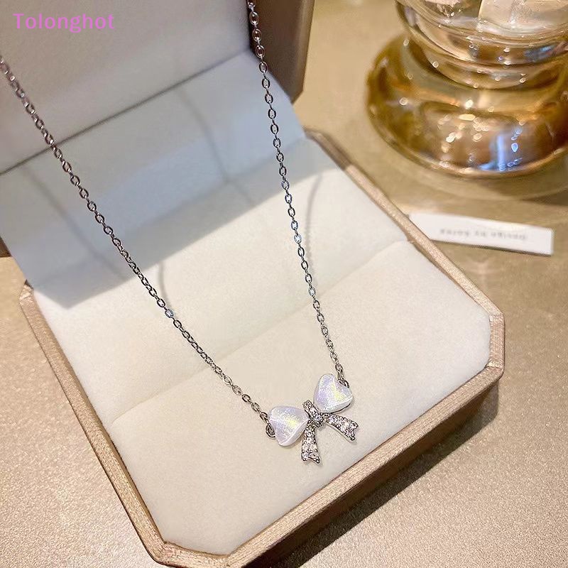 Tolonghot&gt; Versi Korea Zirkon Ikatan Simpul Liontin Kalung Untuk Wanita Warna Silver Ringan Manis Klavikula Rantai Perhiasan Sederhana Elegan well