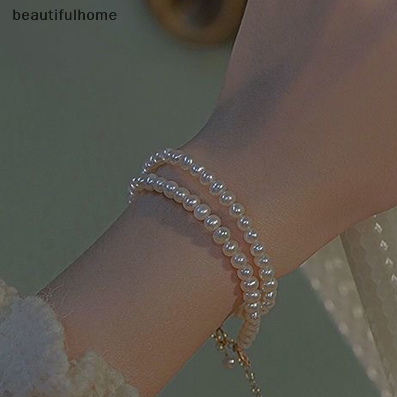 {beautifulhome} Mutiara Imitasi Berongga Tembaga Uang Gelang Yang Dapat Disesuaikan Untuk Elegan Berongga Berkah Beruntung Rumbai Panjang Wanita Pesona Mutiara Gelang Perhiasan Gadis Putri Ulang Tahun Gif