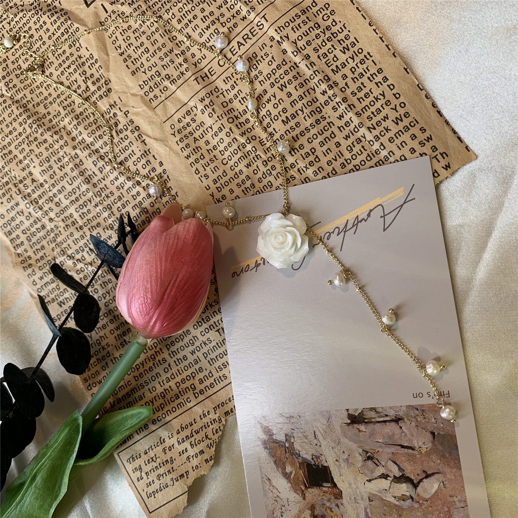 Kalung Bunga Peri Super Cahaya Mewah Desain Niche Mutiara Liontin Kalung choker Berkelas Rantai Klavikula Panjang Perempuan