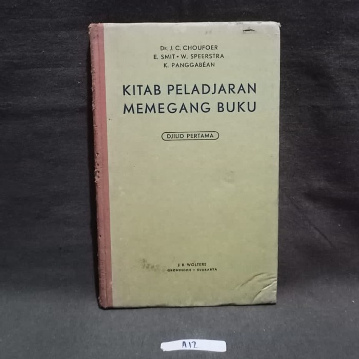 Kitab Peladjaran Memegang Buku