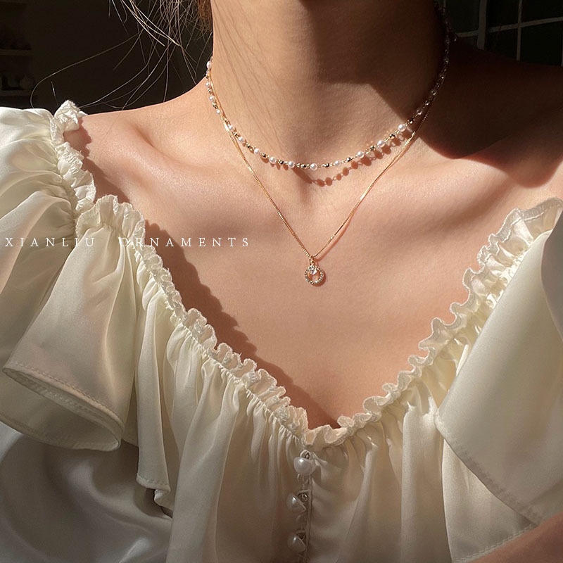 Musim Panas2023Gaya Keren Kalung Mutiara Berlapis Ganda Perempuan ins Temperamen Rantai Klavikula Niche Desain Kalung