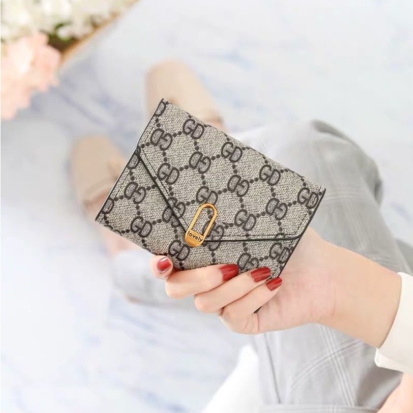 FINOM Cuty - Dompet Mini Lipat Wanita Motif Polos Trendi