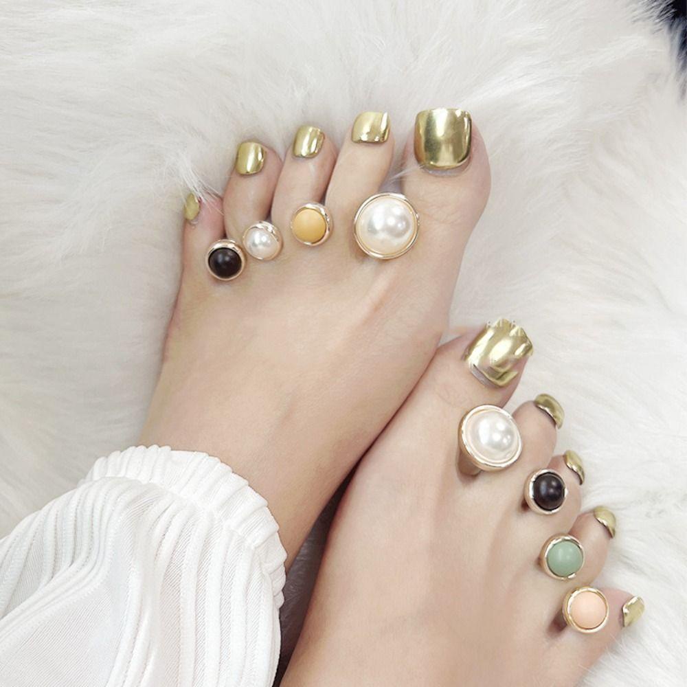 Needway Produk Ortopedi Jari Kaki Desain Marmer Gaya Barok Lembut Untuk Pedicure Silicone Gel Bunion Corrector Spacer Pelindung Jari