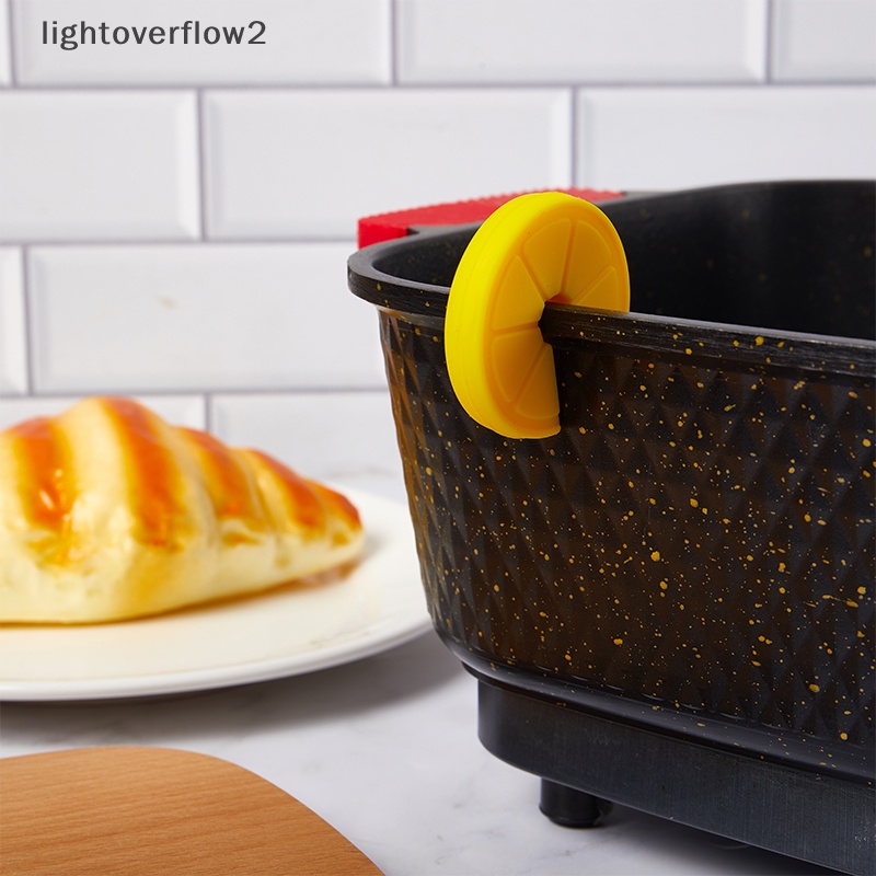 [lightoverflow2] Klip Panci Bentuk Lemon Silikon Food Grade Kreatif Alat Dapur Gadget Anti-Overflow Stoppers Penutup Panci Pengangkat Holder [ID]