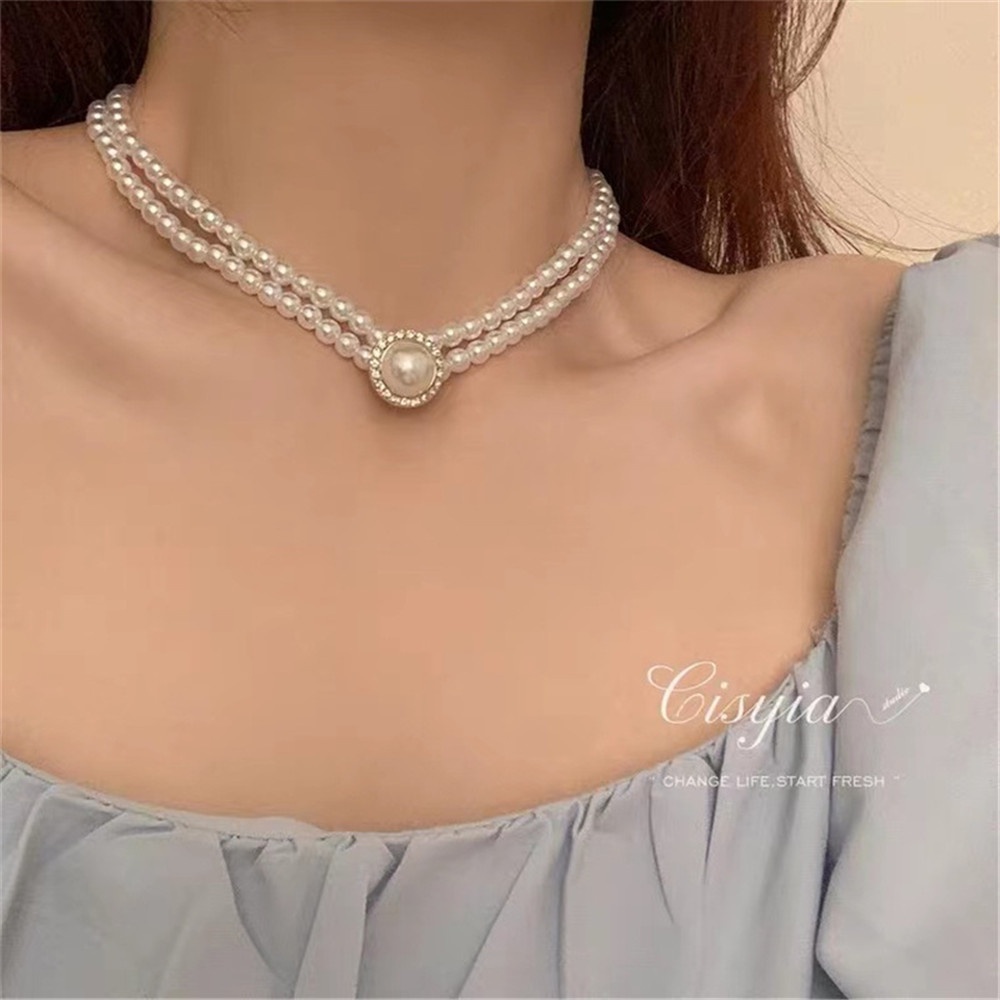 Vintage Hong Kong Gaya Oval Zamrud Hepburn Temperamen Perancis Double Layer Mutiara Kalung Kerah Rantai Anting Pengantin Set Permen Perhiasan