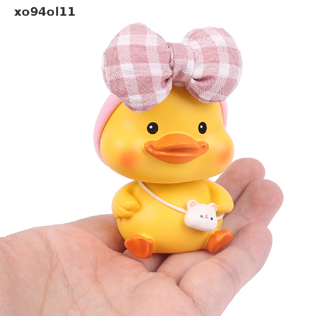 Xo Ornamen Mobil Lucu Resin Busur Bando Bebek Goyang Kepalanya Boneka Dekorasi OL