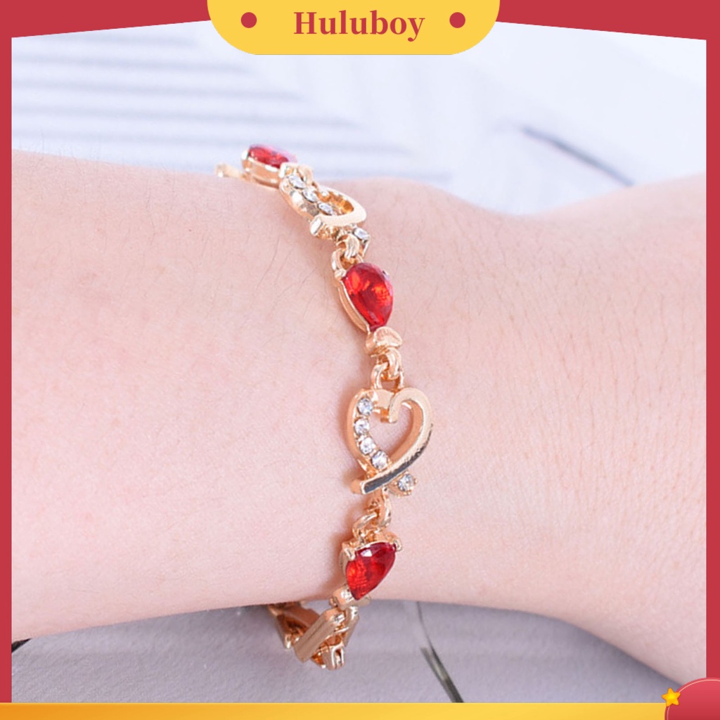 Gelang Rantai Desain Hati Hollow Aksen Berlian Imitasi Warna Merah Bahan Alloy Untuk Wanita