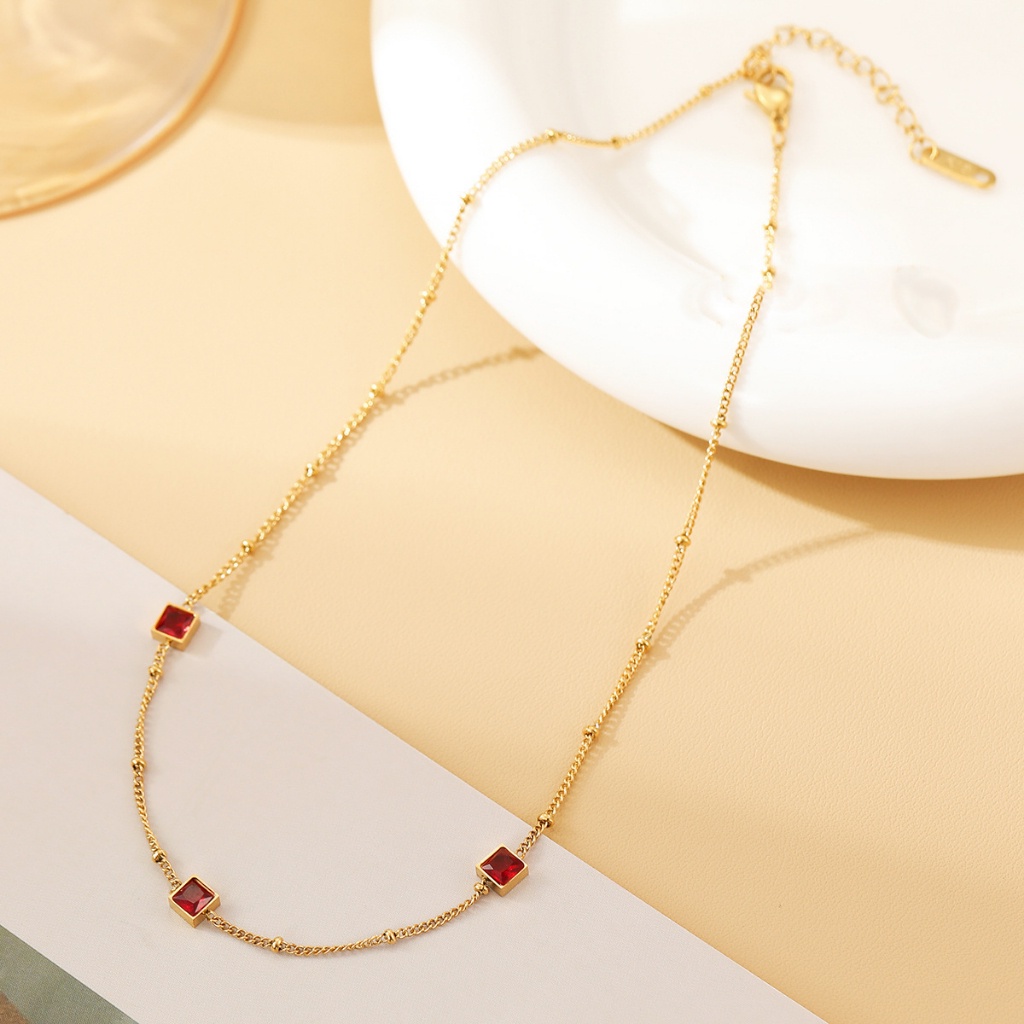 Kalung tiga zircon  titanium stainless steel 316L import anti karat harga grosir bisa cod