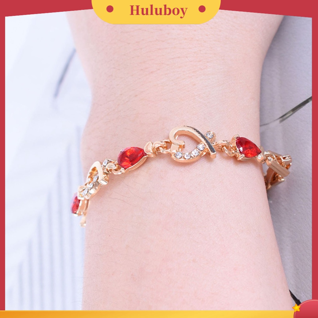 Gelang Rantai Desain Hati Hollow Aksen Berlian Imitasi Warna Merah Bahan Alloy Untuk Wanita