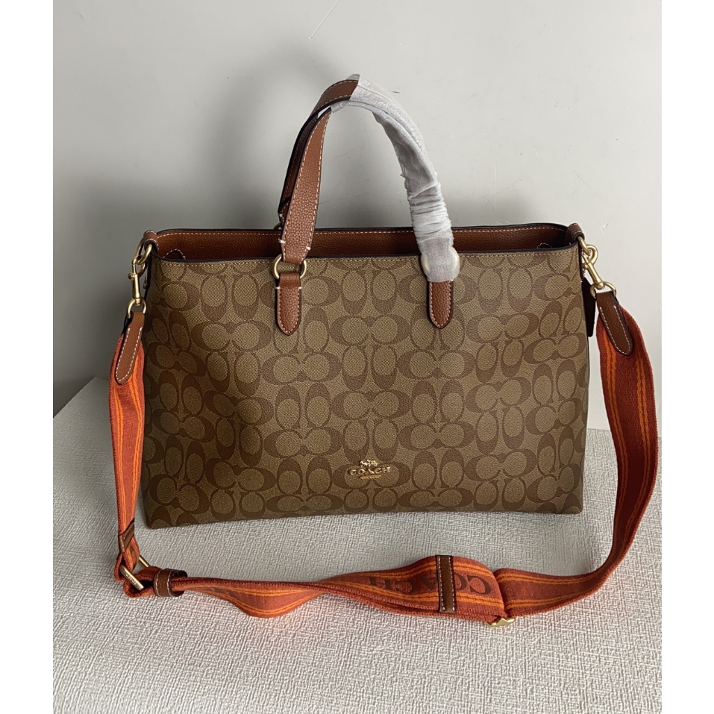 New Coach Classic Signature Collection  Logan Carryall