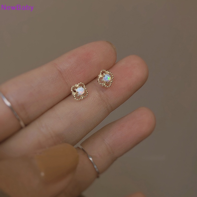 Ewbaby dessylower stud earrings perempuan mini minimalis niche desain berongga batu bulan anting bunga kecil earrings dalika