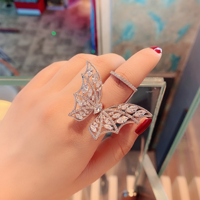 Goldkingdom Fashion Perhiasan Aksesoris Ready Stock Terbang Kupu-Kupu Cincin Kepribadian Fashion Wanita 3D Rasa Canggih Cahaya Mewah Pembukaan Adjustable Makanan Cincin Jala Merah