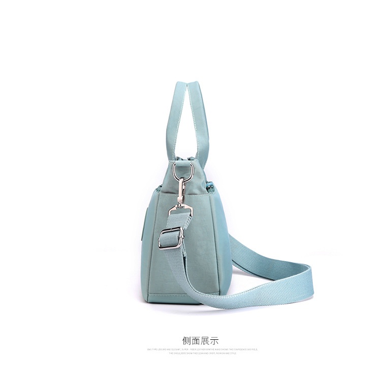 [IMURA]  MR701 Tas wanita baru Jielangshi dengan bahan warna polos, bahu tunggal portabel, tas pengirim multi-saku, ringan, dan berkapasitas besar.