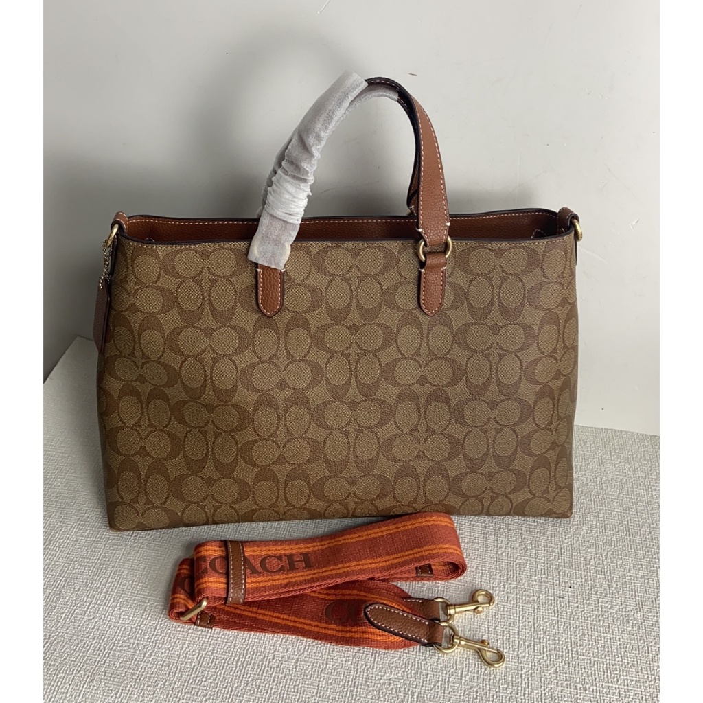 New Coach Classic Signature Collection  Logan Carryall