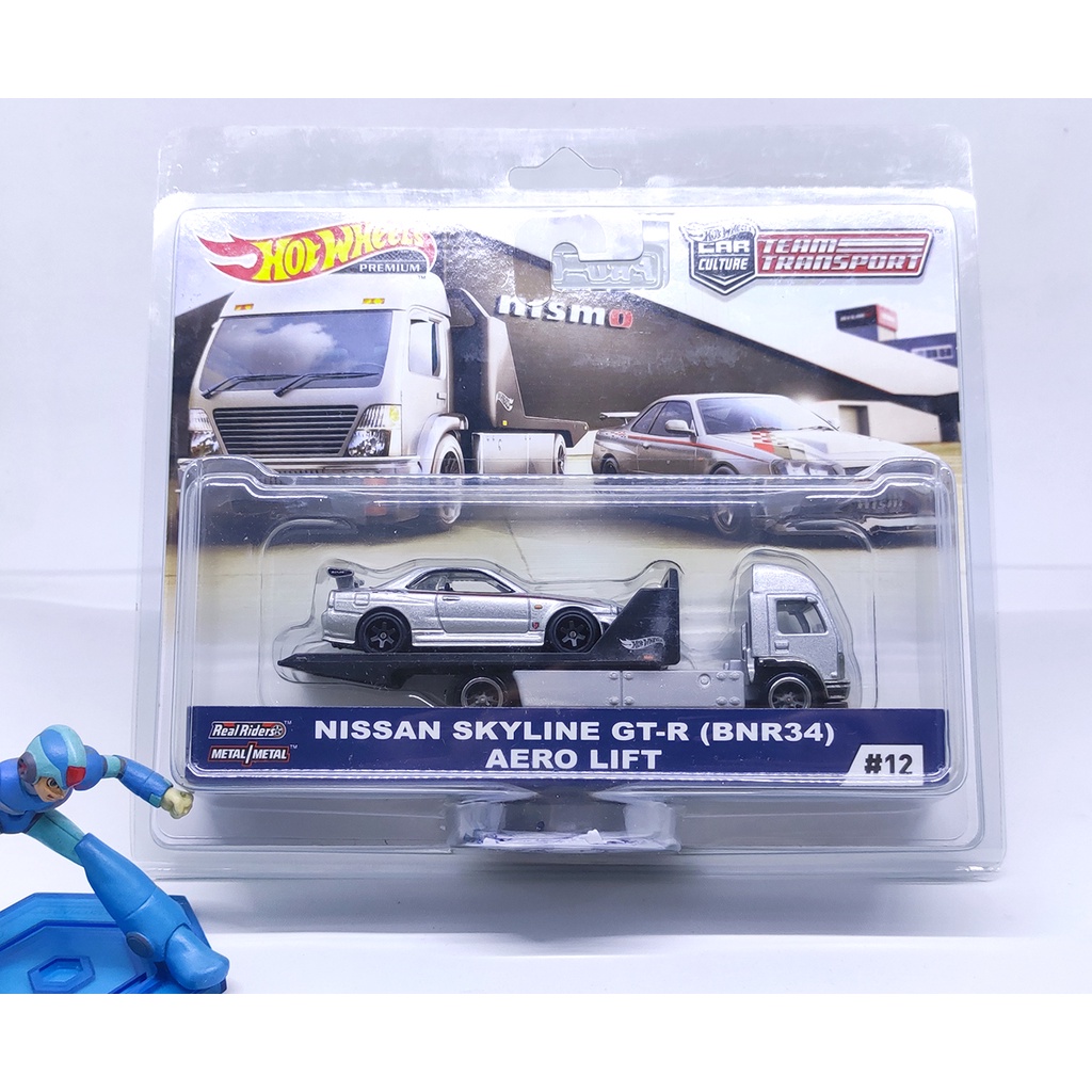 Hot Wheels 1:64 Nissan Skyline R34 NISMO Aero Lift Team Transport