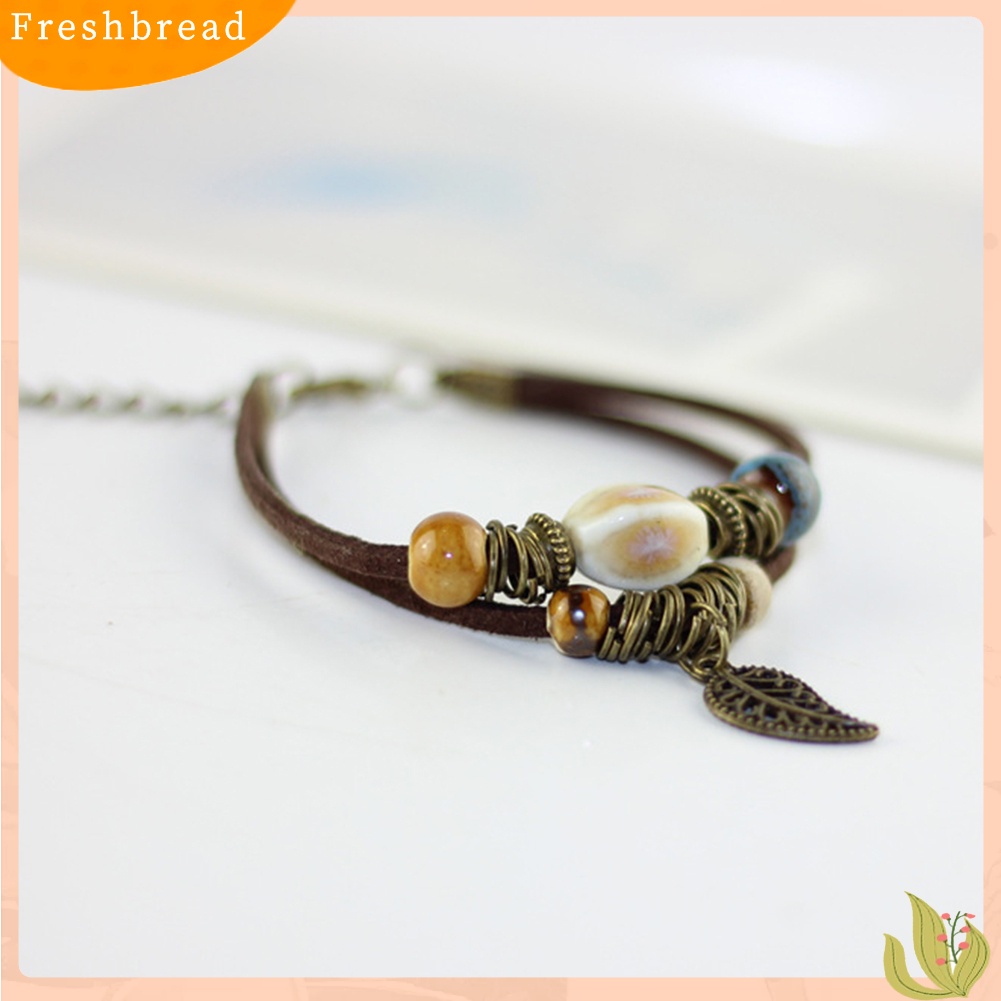 &lt; Freshbread &gt; Bohemian Wanita Double Layer Leaf Charm Ceramics Beads Gelang Tali Kulit Imitasi