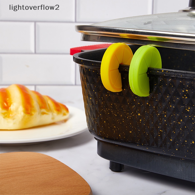 [lightoverflow2] Klip Panci Bentuk Lemon Silikon Food Grade Kreatif Alat Dapur Gadget Anti-Overflow Stoppers Penutup Panci Pengangkat Holder [ID]