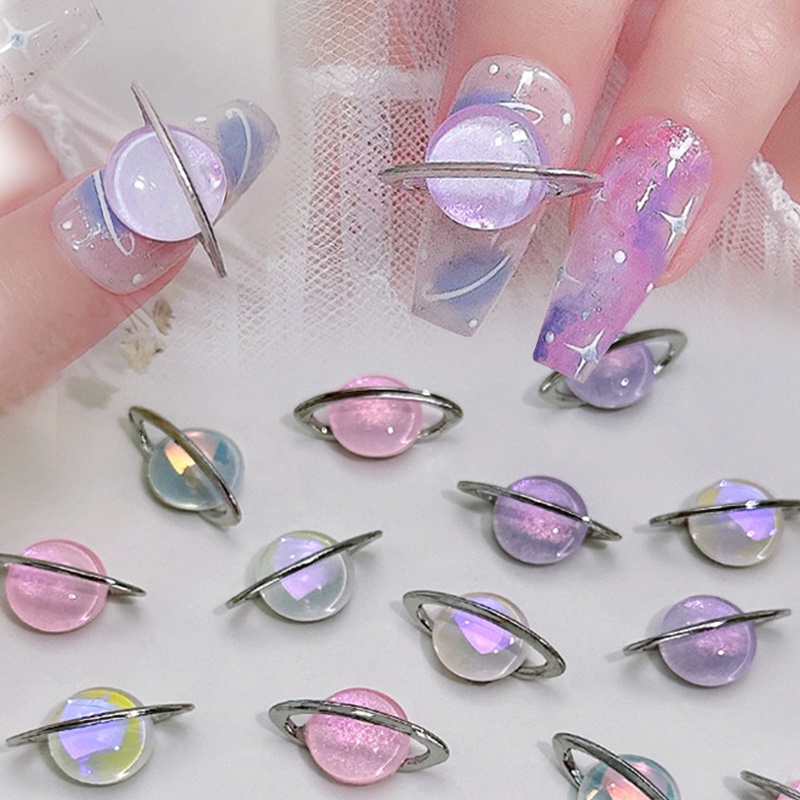 10pcs/bag Saturn Planet Pesona Kuku Putaran Shiny Berlian Imitasi Nail Art Manicure Dekorasi Aksesoris