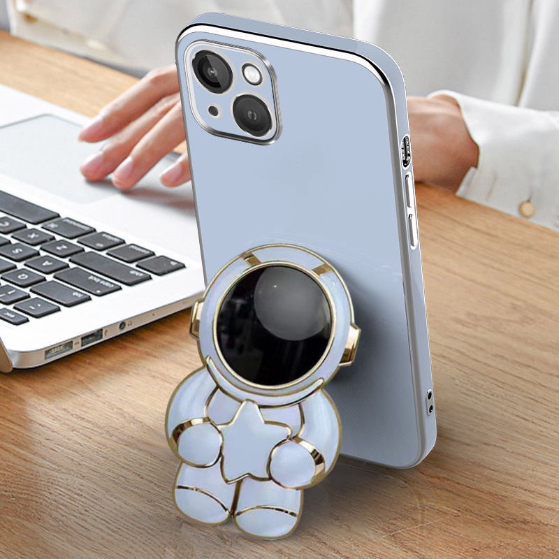Kartun Astronot Memegang Cincin Bintang Snuel Stereo Buku Handphone Multifungsi Malas Desktop Sniper