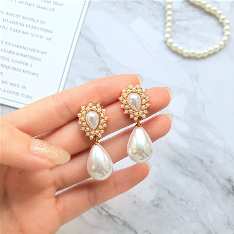 Anting Mutiara Oval Korea Jarum Silver Untuk Wanita Dengan Desain Retro Sense Earrings and Earrings Untuk Wanita