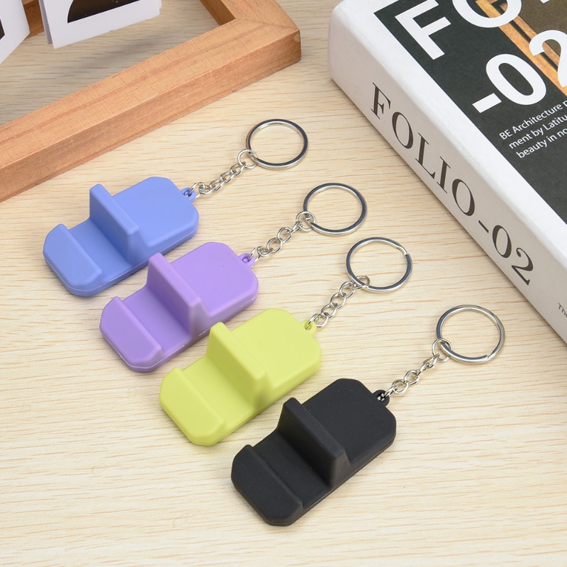 Mini Berkualitas Tinggi Sederhana Beberapa Warna Luar Dalam Ruangan Ponsel Berdiri Universal Stylish Portable Compact PVC Keychain Ring Holder