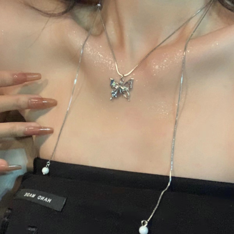Niche Desain Logam Kalung Temperamen Serbaguna Kupu-Kupu Tetes Air Perak Pribadi Rumbai Manis Kalung Pribadi Wanita