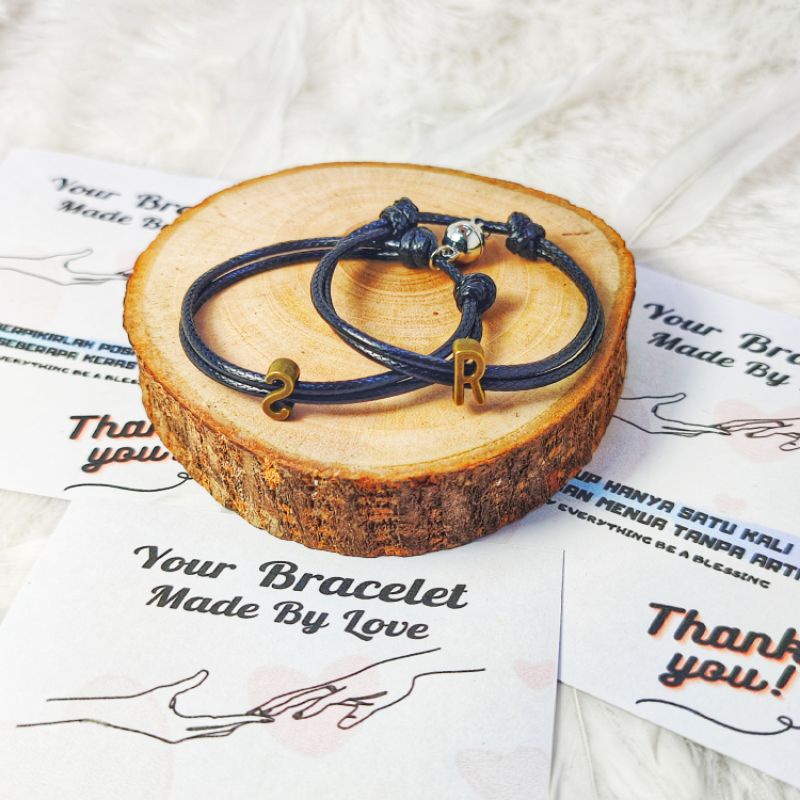 (COD) Gelang Pasangan Magnet Couple Inisial Huruf Logam | Tali Korea Hitam 2mm | Huruf Bronze | Nama