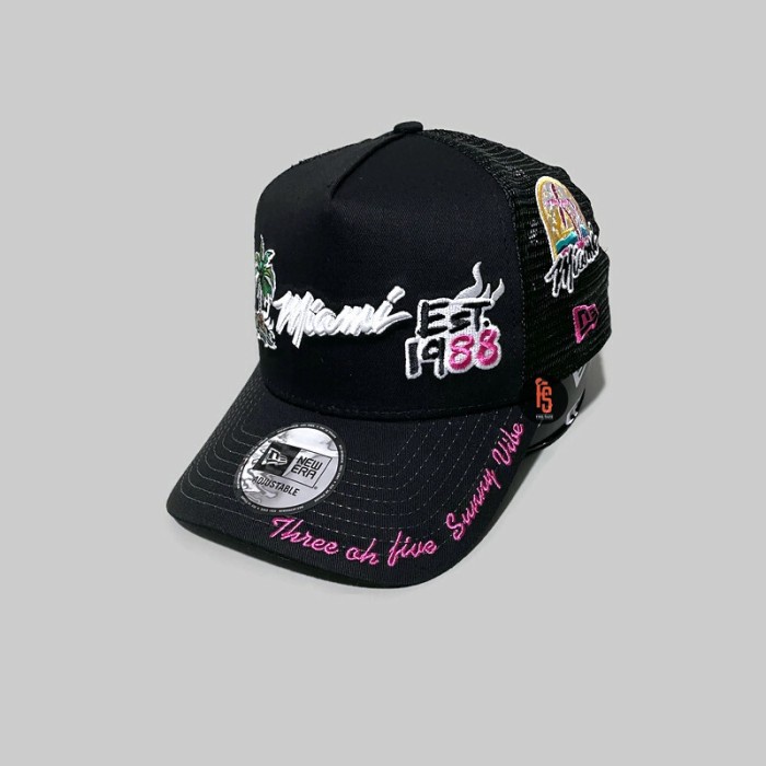 TOPI NEW ERA ORIGINAL TRUCKER AOP GRAPHIC MIAMI HEAT BLACK