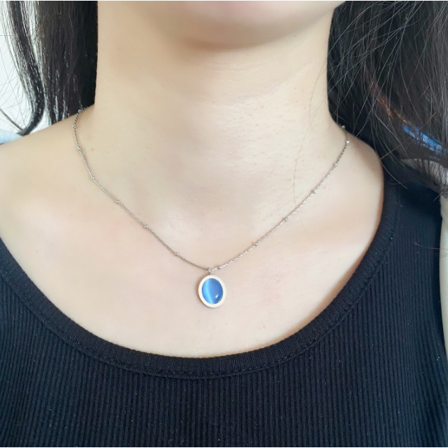 Kalung Titanium Steel Mata Kucing Oval Biru Gaya Retro Perempuan Anti Karat Lapis Emas Rantai Klavikula