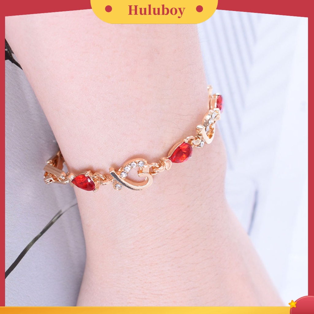 Gelang Rantai Desain Hati Hollow Aksen Berlian Imitasi Warna Merah Bahan Alloy Untuk Wanita
